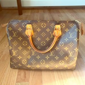 Louis Vuitton authentic speedy 25 bag